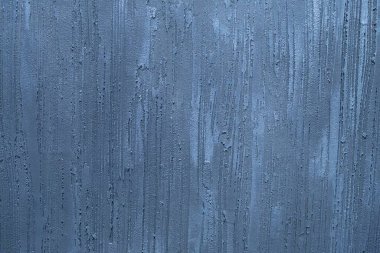 Antrasit ve mavi dekoratif alçılı beton duvar dokusu. Metin için yeri olan soyut arkaplan