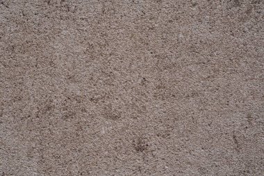 Eski taş, beton duvar dokusu yakın plan.