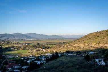 Aerial view of Santa Cruz Chile. Vineyard region with the Andes mountain range behind. Tourist site of vineyards in Chile clipart