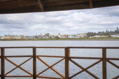 Town of Llanquihue seen from the town dock on Lake Llanquihue clipart