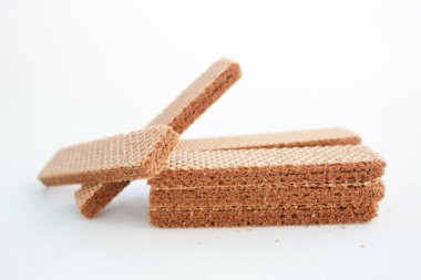 Beyaz arka planda izole edilmiş çikolatalı waffle. Çıtır çıtır tatlı. Gıda Fotoğrafçılığı Konsepti