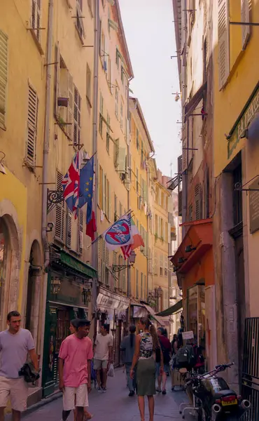 stock image Nice, France - 08-07-2001: tourists in the narrow streets in the old quarters of the city of Nice, France around 2001