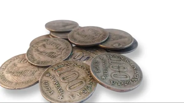 stock image one hundred rupiah 100 rupiah old currency. a background photo of Indonesian coins printed in 1973