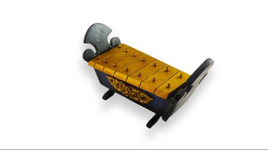 Miniature Indonesian Javanese Traditional Gamelan Music Instruments in White Isolated Background clipart