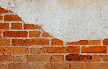 Eski ahşap bir evin tuğla duvar arkası, Tayland 'ın kuzeydoğu bölgesinde, Loei Eyaleti' nin Chiang Khan bölgesinde popüler bir giriş yeri..