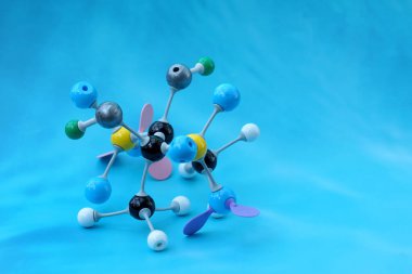 Simulate Shape of covalent molecules on a blue background. Soft and selective focus.                               clipart