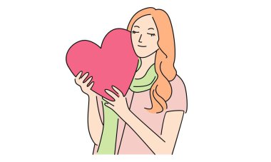 Sevimli bir kadın kalp işareti taşıyor.