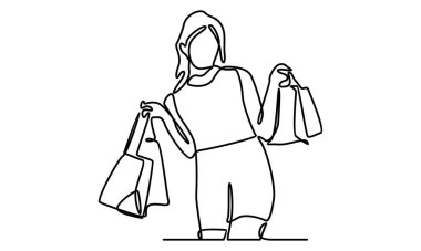 Elinde kese kâğıdı olan genç bir kadın.