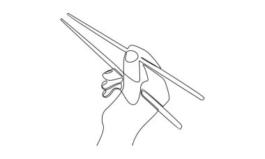 Devamlı el çizgisi yemek çubuklarını tutuyor. Asya geleneksel çatal bıçak takımı