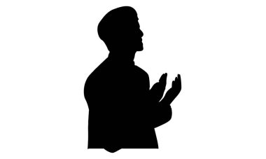 Müslüman erkeklerin silueti dua ediyor.