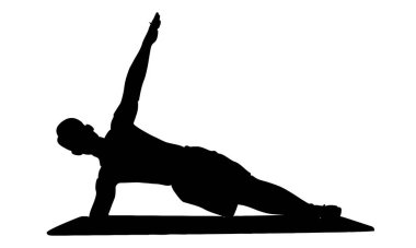 Yoga pozu veren bir adamın silüeti.