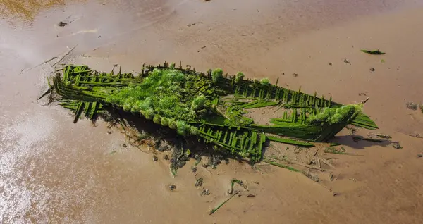 stock image Moss-Covered Shipwreck on Sandy Shore, Ballina, Ireland, Co. Mayo.