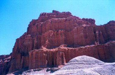 Impressive rock wall sculpted by erosion. clipart