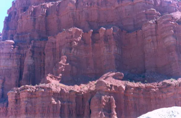 stock image Immense rock wall with different geological strata