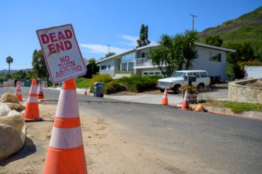 Residents in the upscale neighborhood of Rancho Palos Verdes, California are experiencing road closures and public works disruptions due to ongoing and unprecedented land movement in the area. clipart