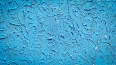 Mavi desenli bir duvar.