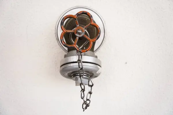 stock image Water hydrant on a building wall