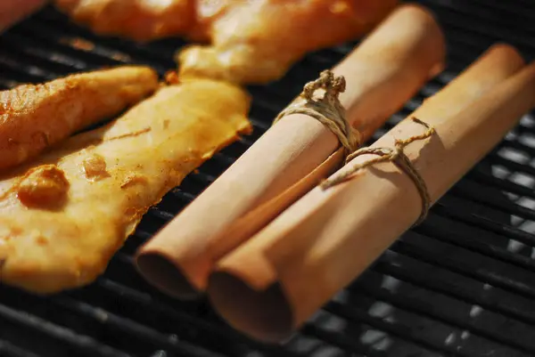 stock image BBQ barbecuing in smoked wood