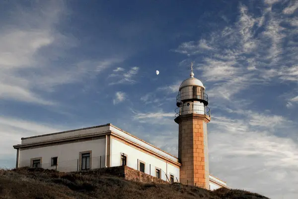 stock image Larino , Spain. Beautiful lighthouse at the Atlantic coast in northern Spain in the areo Galicia. October 11th 2006