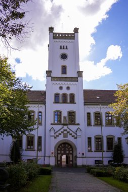 Aurich , East Frisia , Lower Saxony, Germany. Historic building Aurich Castle in the center .Today district court.  October 4th, 2024 clipart