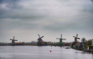 Zaanse Schans , Zaandam, Netherlands. Famous landmark Zaanse Schans with his historical buildings and windmills. Museum area. November 10th, 2024 clipart