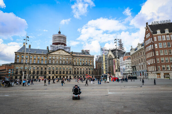 Netherlands, Amsterdam. September 29, 2025. Canals, facades, and movement.Facade of the royal palace.