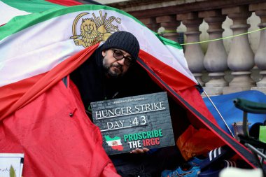 London, UK  April 6 2023. British-Iranian human rights activist Vahid Beheshti on day 43 of a hunger strike outside the Foreign Office clipart