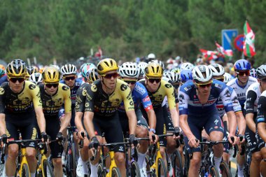 Gregaard Jonas Wilsly of team Uno X leads a small group up the Cte de San Juan de Gaztelugatxe on stage 1 of the 2023 Tour de France clipart