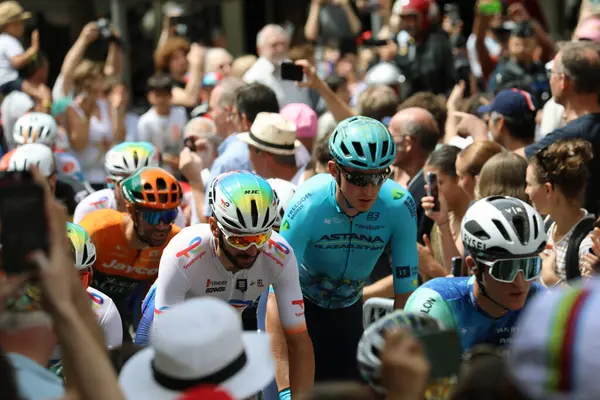 stock image Troyes, France  7 July 2024. Anthony Turgis of TotalEnergies rolls out of Troyes among the peloton at the start of stage 9 of the 2024 Tour de France