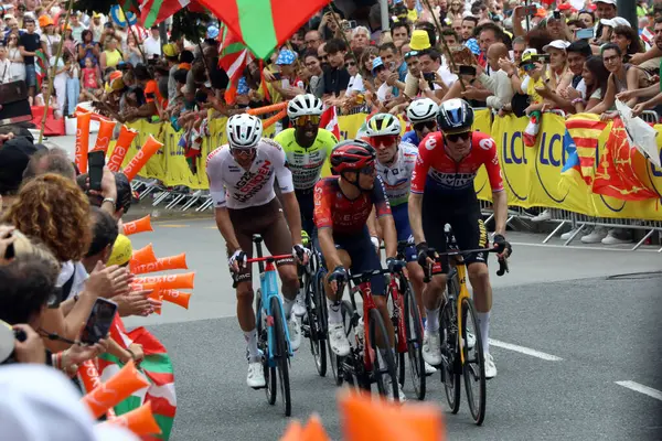 stock image Dylan Van Baarle of Jumbo Visma talks to an Ineos Grenadiers rider at the end of stage 1 of the 2023 Tour de France in Bilbao