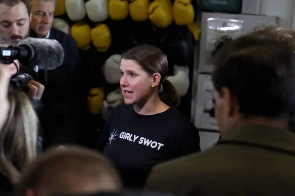 stock image London / UK  November 13, 2019. Liberal Democrats leader Jo Swinson wearing a Girly Swot t-shirt speaking to media at an election campaign stop at the Total Boxer Gym, north London