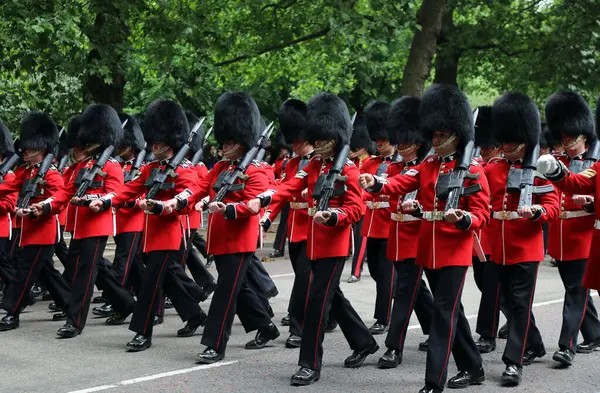 stock image Members of the Household Division march down Birdcage Walk, central London, during rehearsals for Trooping the Colour on 31 May 2017.