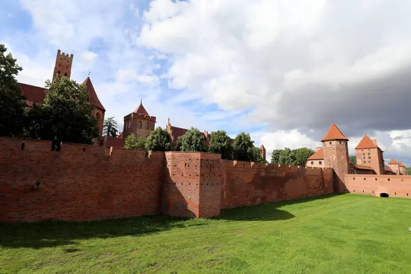 stock image The defensive walls of Malbork Castle, built by the Teutonic Knights in the town of Malbork, Poland, photographed on 21 August 2017