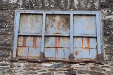 rusty gate with an old wall. clipart