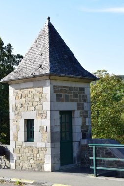 a historic hut on an old bridge clipart