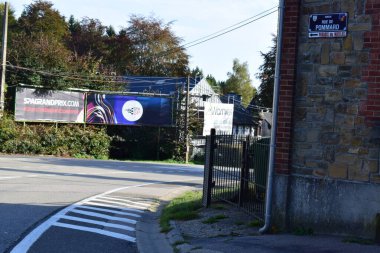 road sign in the village towards the race track Spa - Francorchamps clipart