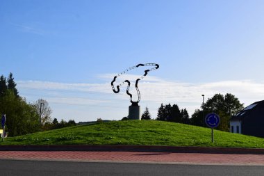  track shape of Spa - Francorchamps, Belguim on a traffic circle clipart