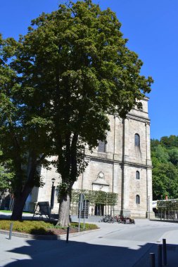 church Malmedy with a giant tree clipart