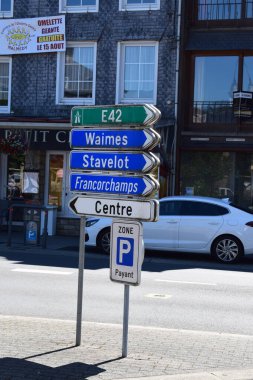 street signs to Waimes, Stavelot and Francorchamps clipart