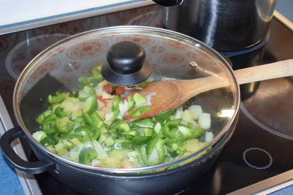 stock image paprika and bacon frying