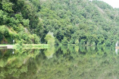 calm Saar above the river lock Mettlach clipart