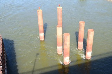 pylons in the river clipart