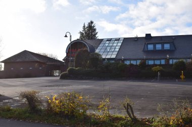 parking and entrance of the amusement park in Klotten an der Mosel clipart