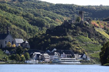 autumn colored Mosel valley with village Briedern, Germany clipart