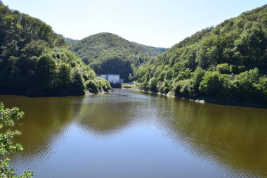 beautiful landscape with a river and a lake in Luxembourg clipart