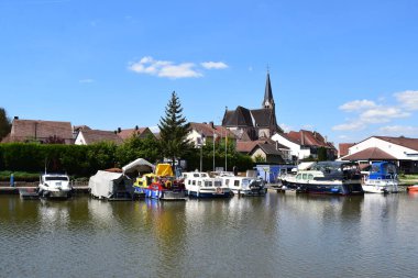 the river and the village of Wittring, Lorraine clipart