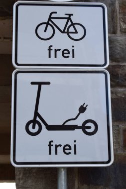 bicycle signs on the road in the city  clipart