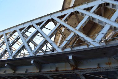 lower of the bridges on two levels crossing each other and the Moselle in Thionville clipart