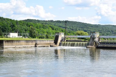 river lock system with a sluice in Apach, France and Schengen, Luxemoburg clipart