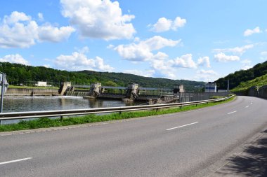 river lock system with a sluice in Apach, France and Schengen, Luxemoburg clipart